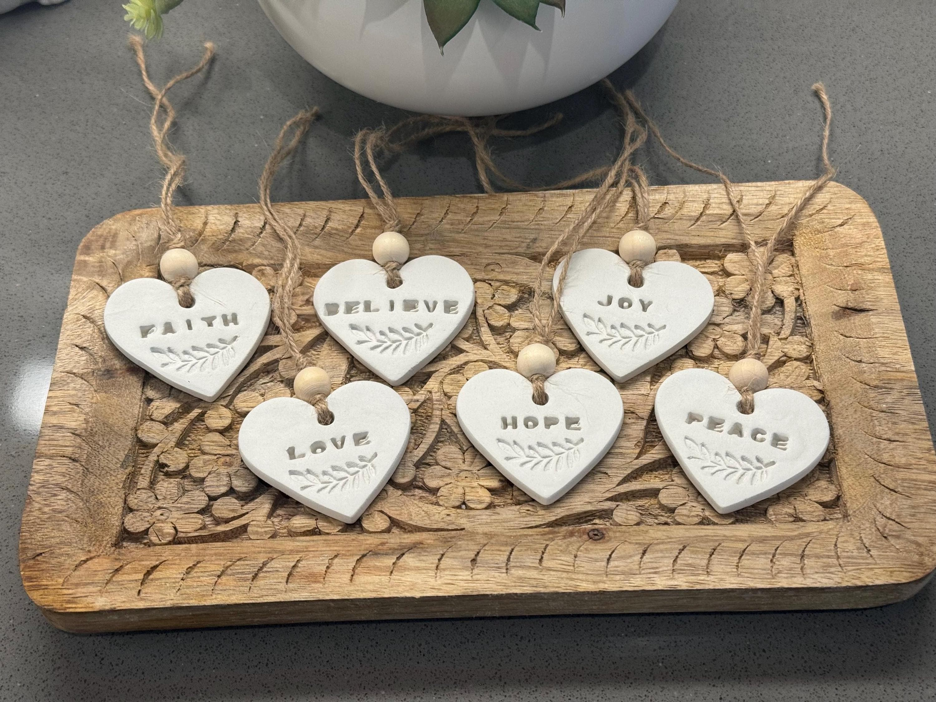 Handmade Clay Heart Christmas Ornament with Noel & Merry Stamped Words, Rustic Pottery Holiday Tree Decoration with Twin Handmade Clay Heart Christmas Ornament with Noel & Merry Stamped Words, Rustic Pottery Holiday Tree Decoration with Twin