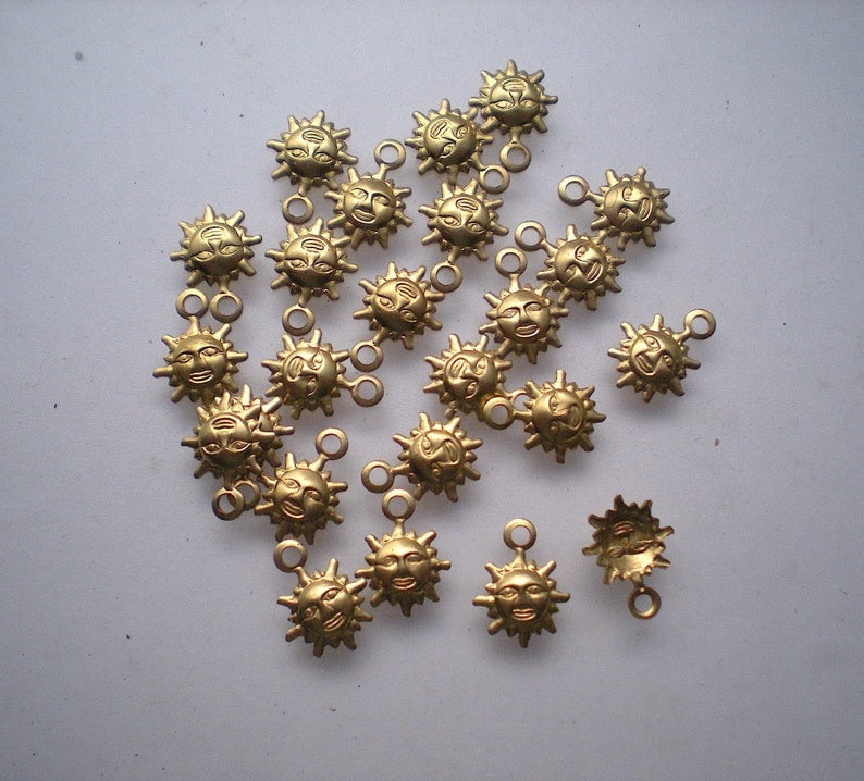 24 Tiny Brass Sun Charms for Jewelry Making and Scrapbooking 24 Tiny Brass Sun Charms for Jewelry Making and Scrapbooking